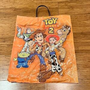 Pixar Toy Story 2 Halloween Trick or Treat Bag 2002. Orange Woody Bag.